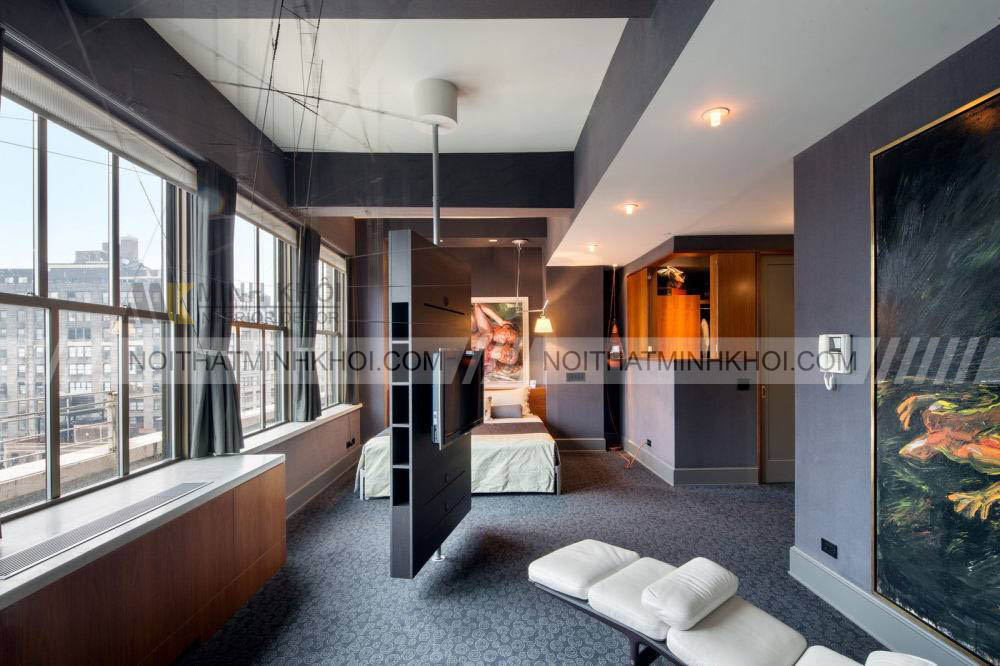 Kệ tivi ngăn phòng khách và bếp xoay được